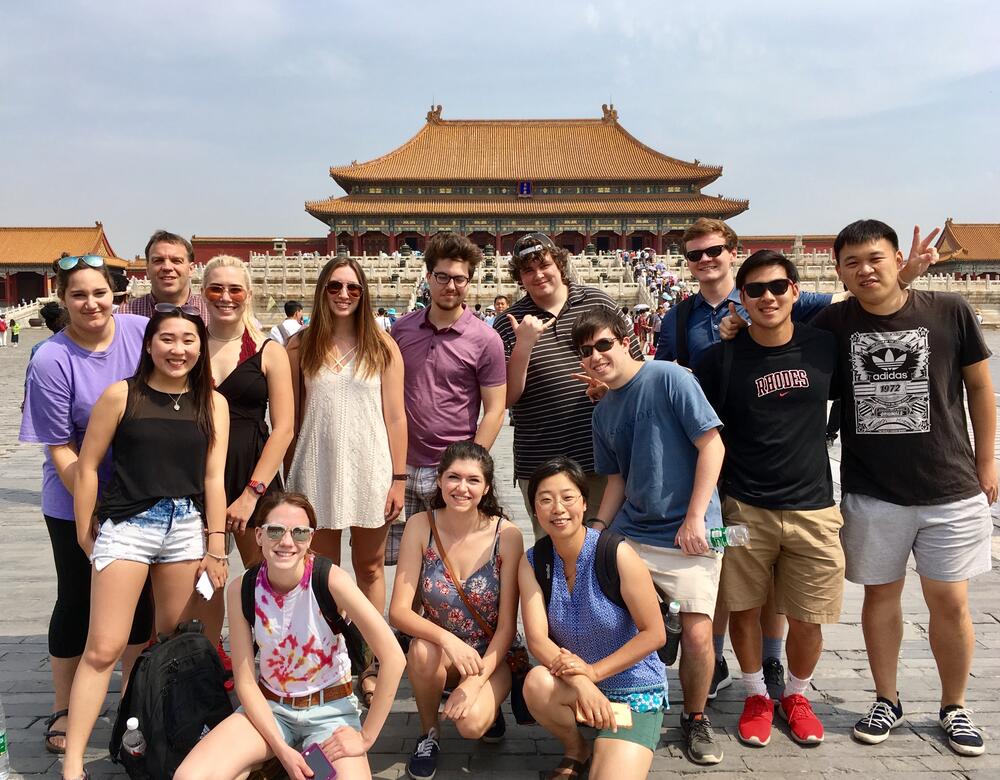 students in front of a Chinese temple