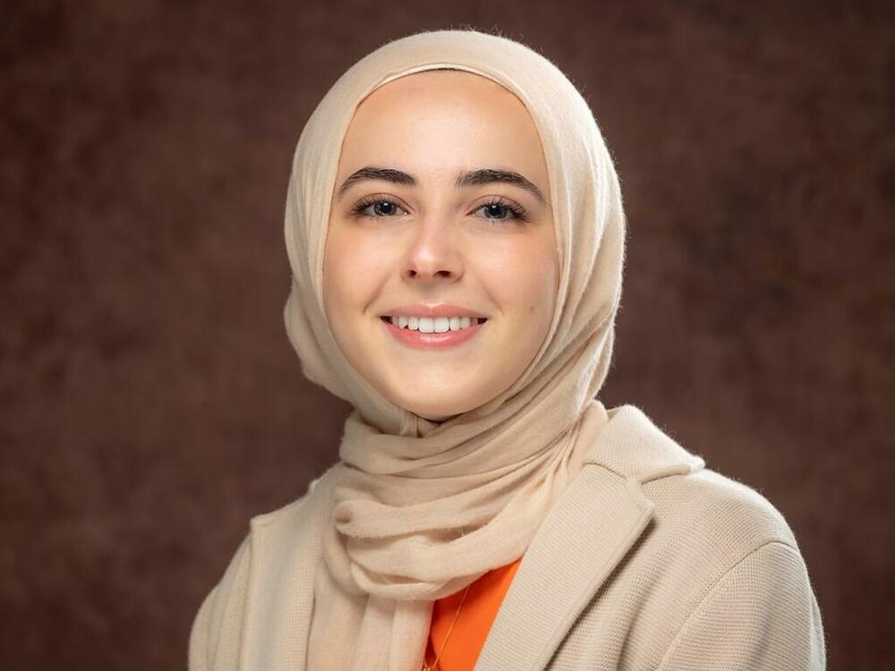 a young woman in a hijab 