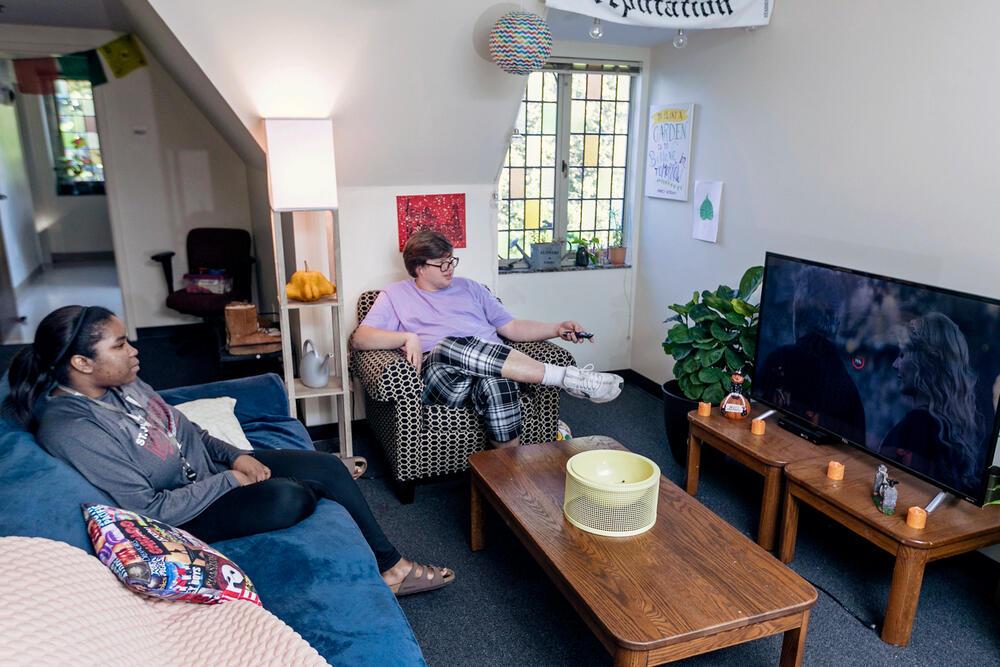 students relax in a dorm room