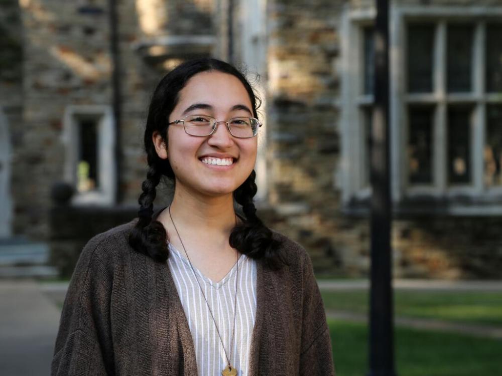 a young woman with glasses