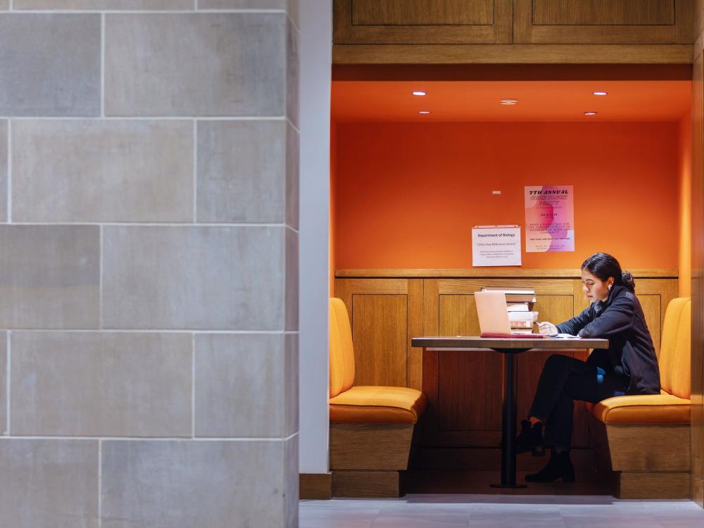 student studying and writing notes