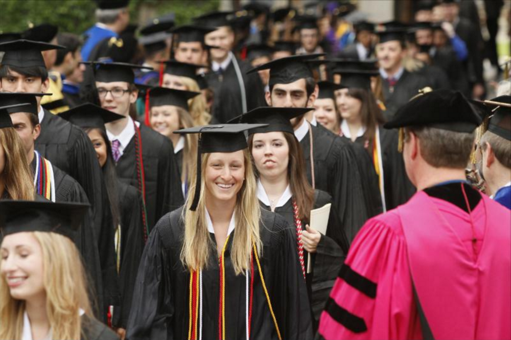 students in graduation robes